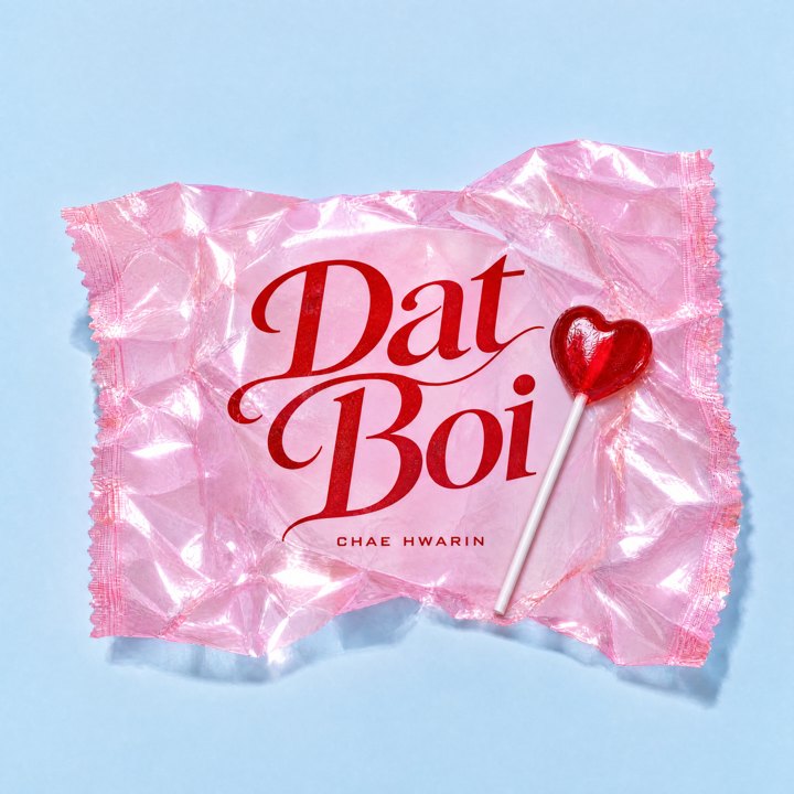 Dat Boi single cover: a pink candy wrapper with a heart lollipop and the title in red script